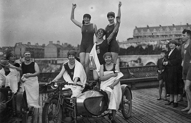 Christmas Dip
27th December 1921: Members of the Plymouth Ladies and 7 o'clock Regulars Swimming Club arrive on motorbikes for their swim on Christmas morning. (Photo by Gill/Topical Press Agency/Getty Images)